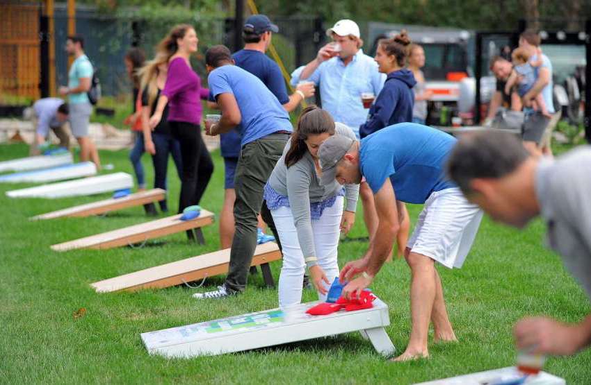 People Playing Cornhole